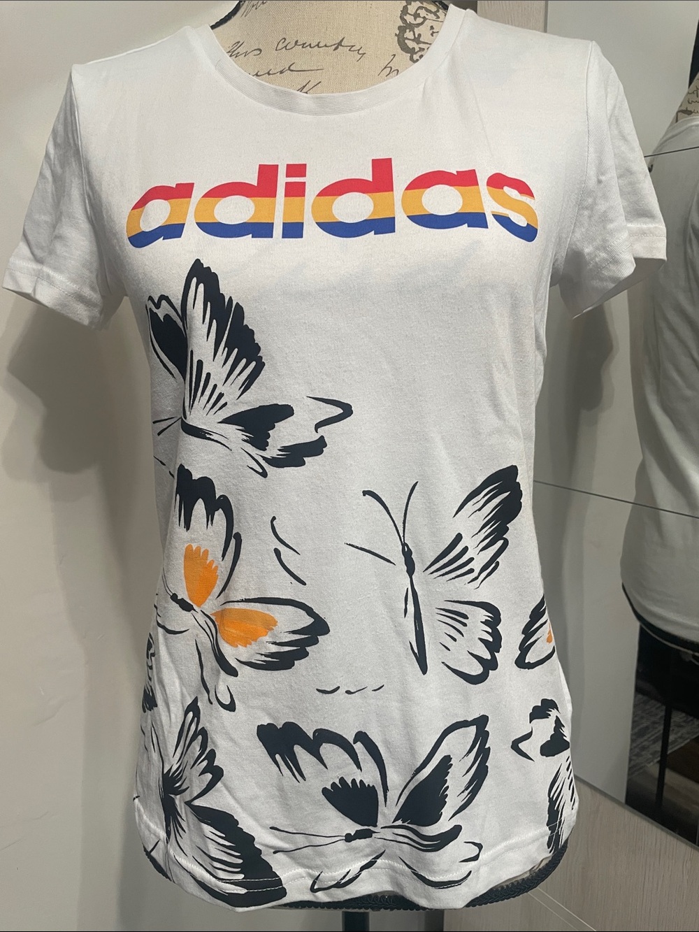 adidas White Short Sleeve Tee with Multicolor Logo & Butterfly Print